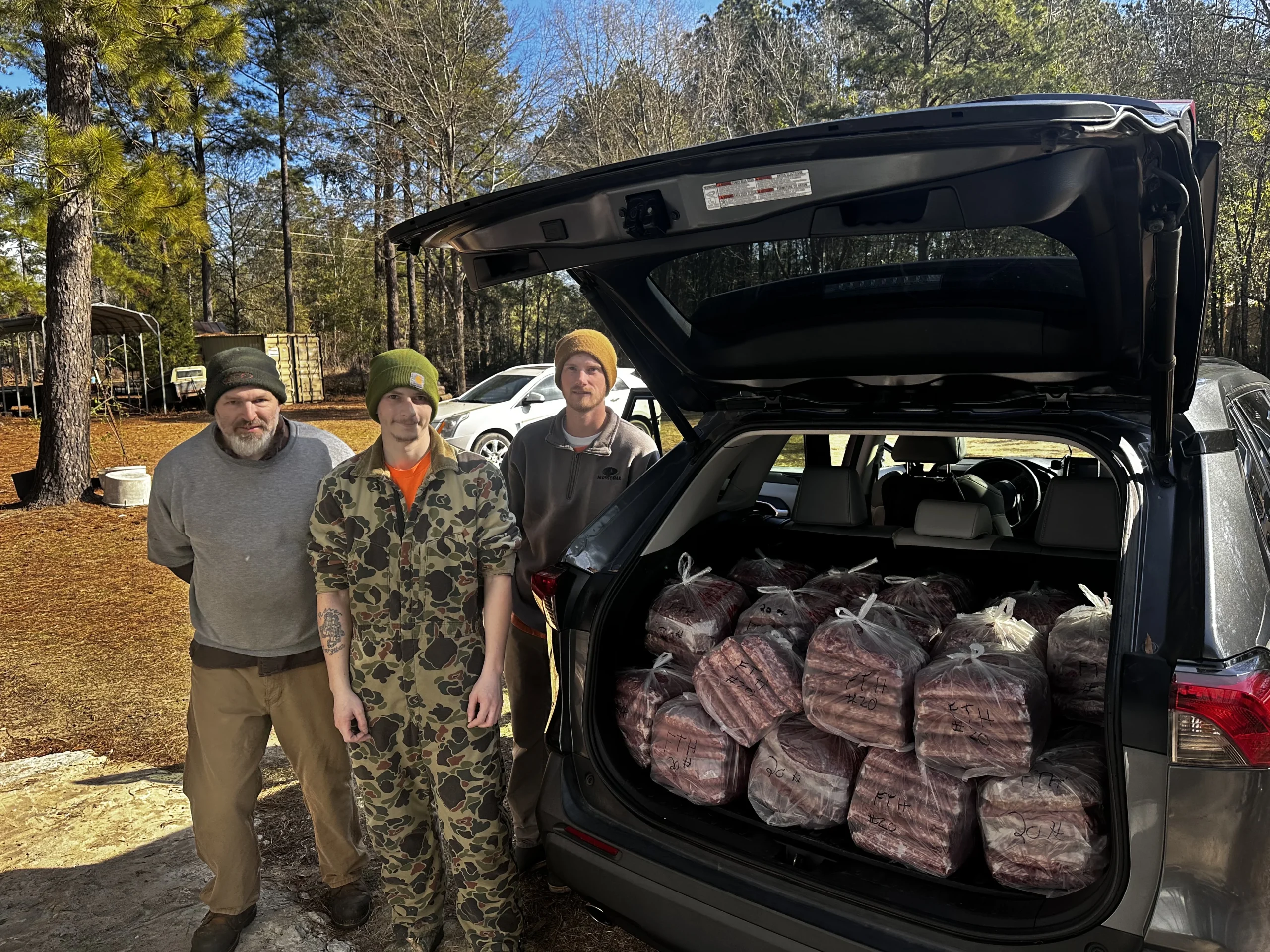 Dempsey Deer Processing loading over 500 lbs of venison for a nonprofit partner